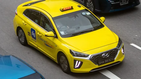 CityCab Hyundai Ioniq in yellow livery