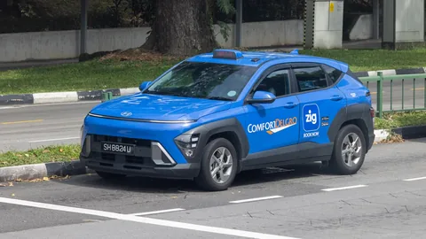 Comfort Taxi Hyundai Kona parked in an HDB estate