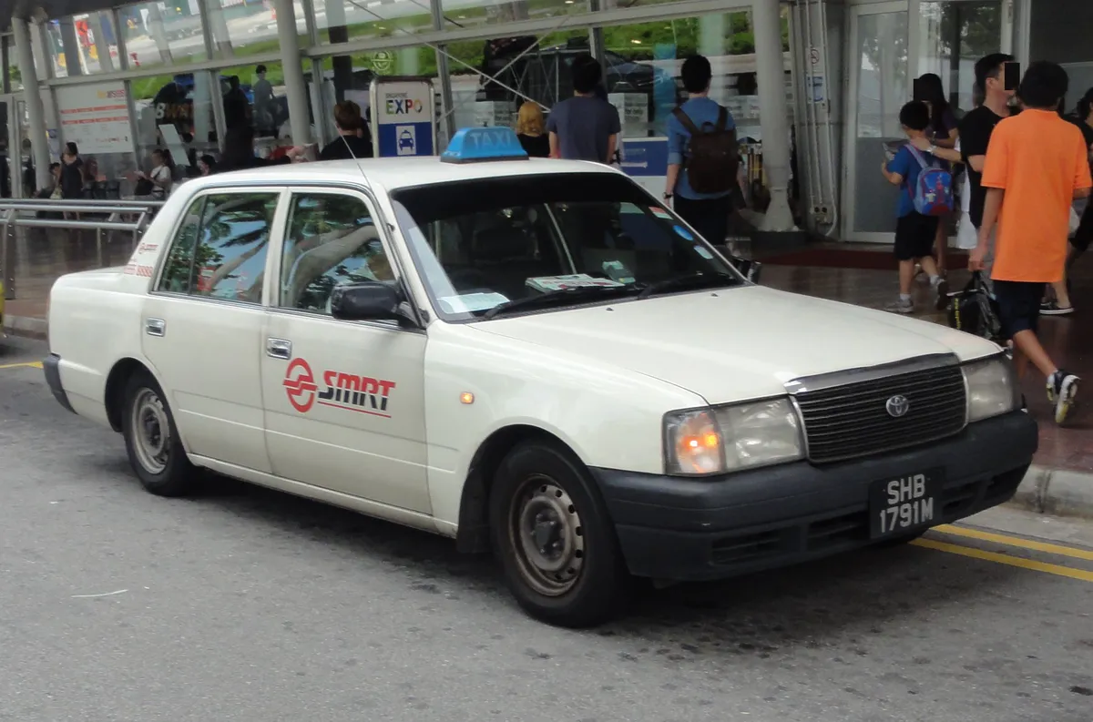SMRT taxi Toyota Crown Comfort waiting at Singapore Expo taxi stand