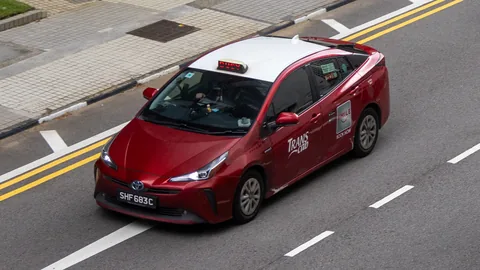 Trans-Cab Toyota Prius on the highway